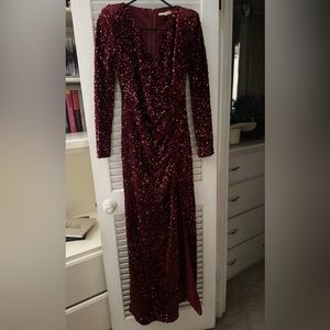 Boutique long, formal, wine colored, thigh-high slit, plunging neckline